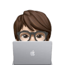 Image of Salman peeking from behind of a laptop